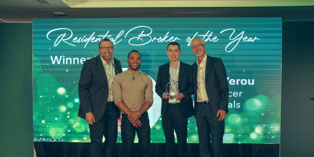 George Yerou collects Residential Broker of the Year award